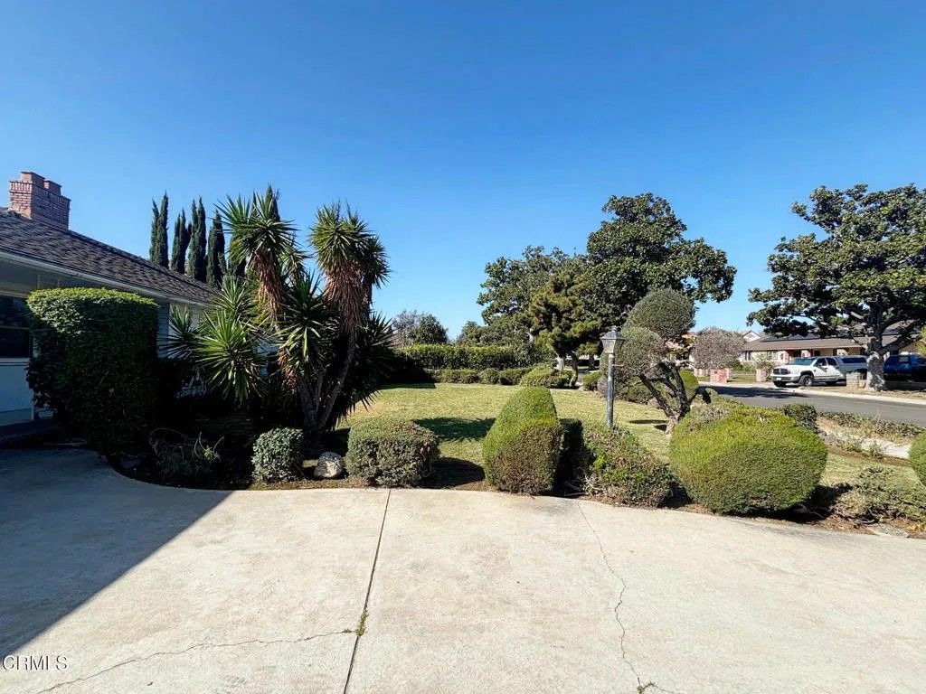 Photo of 210 W Woodruff Avenue, Arcadia, CA 91007 (MLS # P1-25658)