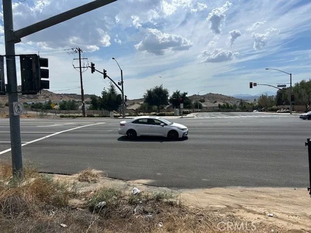 Photo of 0 NW Corner of Ramona Expressway &amp; Rider St, Perris, CA 92571 (MLS # IV25235052)