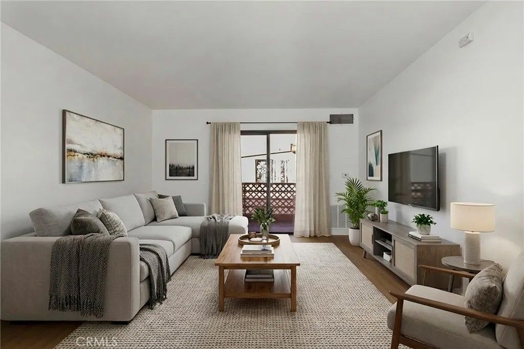 Photo of 6815 Remmet #311, Canoga Park, CA 91303 (MLS # BB25273414)