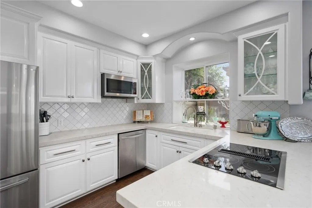 Photo of 7805 Garfield Ave, Huntington Beach, CA 92648 (MLS # OC26045950)