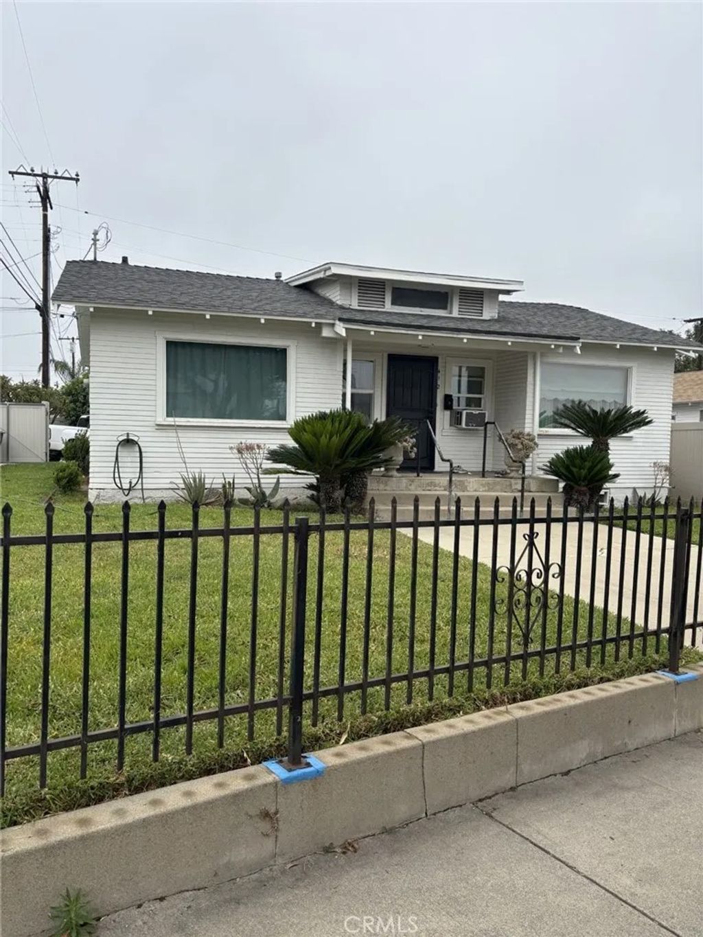 Photo of 412 E Grand Boulevard, Corona, CA 92879 (MLS # IV26096970)