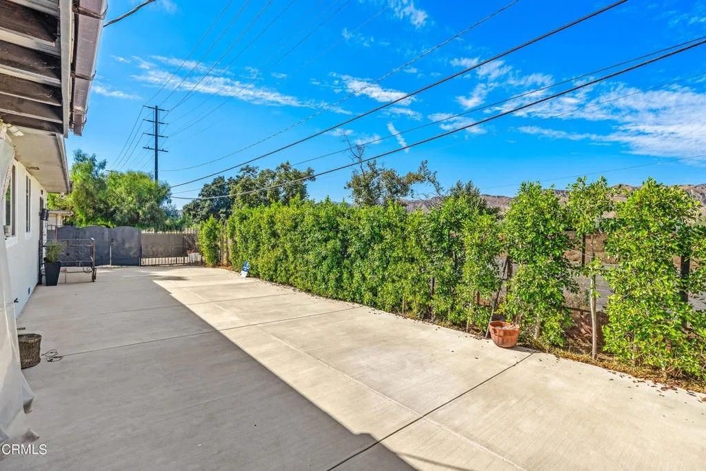Photo of 9850 Wentworth Street, Los Angeles, CA 91040 (MLS # P1-26361)