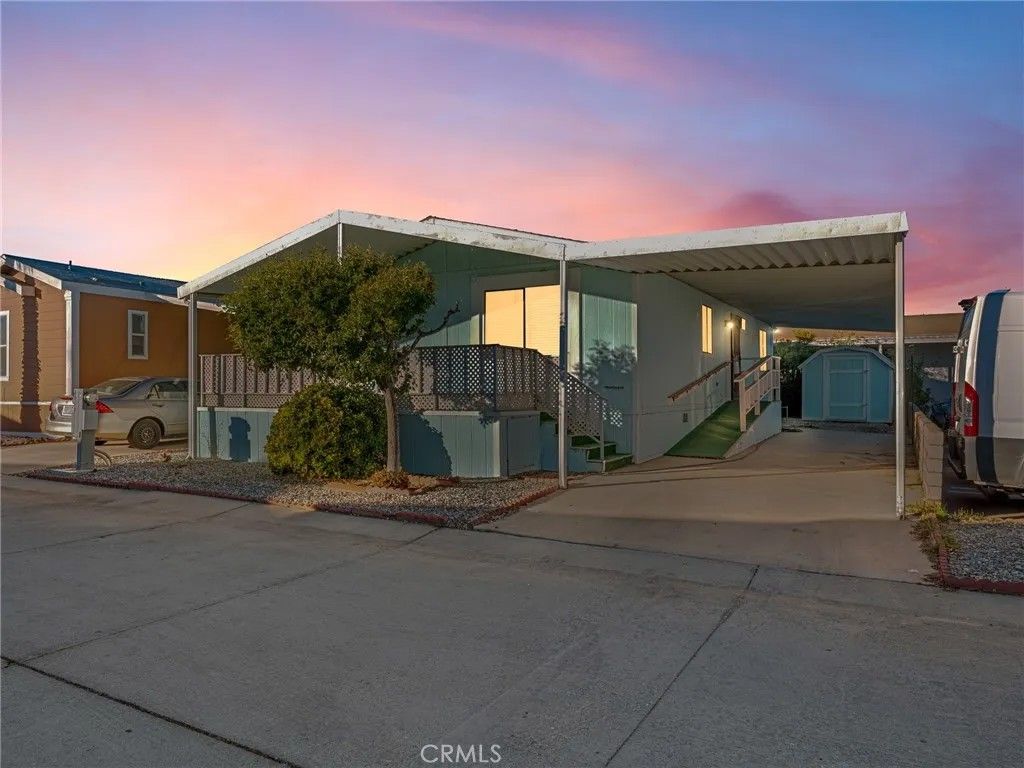 Photo of 22020 Nisqually Rd #11, Apple Valley, CA 92308 (MLS # HD25271588)