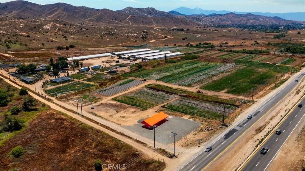 Photo of 19203 Cajalco Rd, Perris, CA 92570 (MLS # IV25152612)