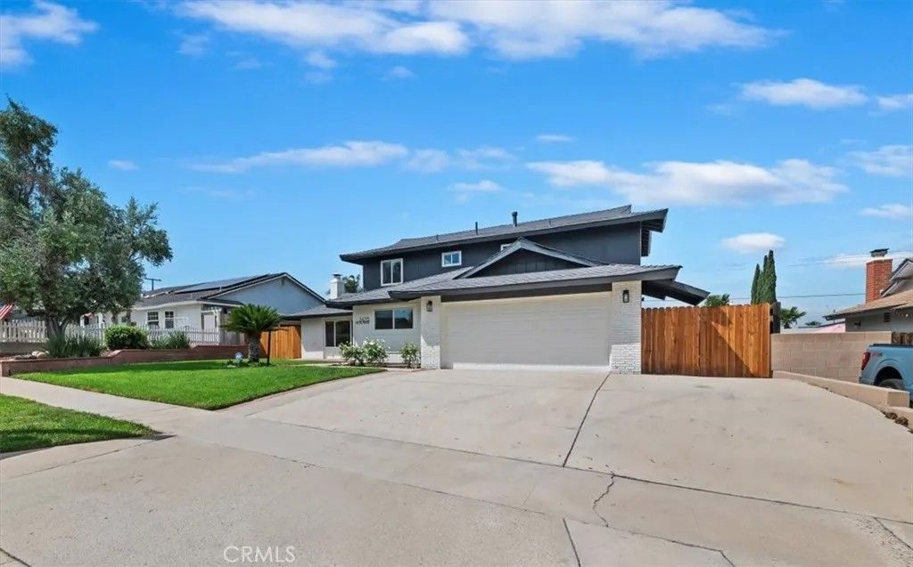 Photo of 2476 Grove Ave, Corona, CA 92882 (MLS # IG25219336)