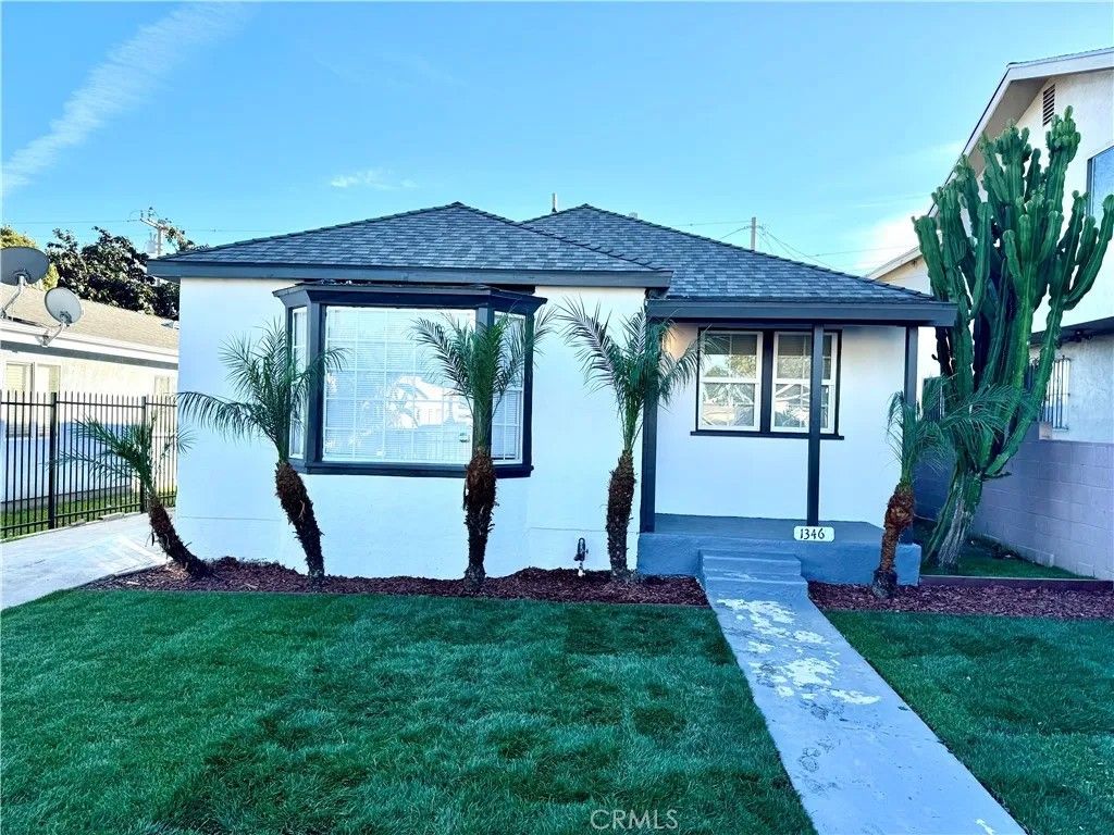 Photo of 1346 W 92nd St, Los Angeles, CA 90044 (MLS # PW26011787)