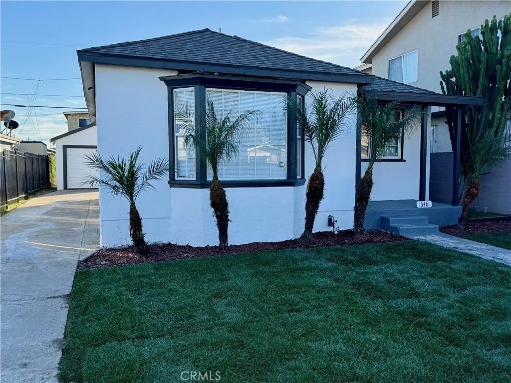 Photo of 1346 W 92nd St, Los Angeles, CA 90044 (MLS # PW26011787)