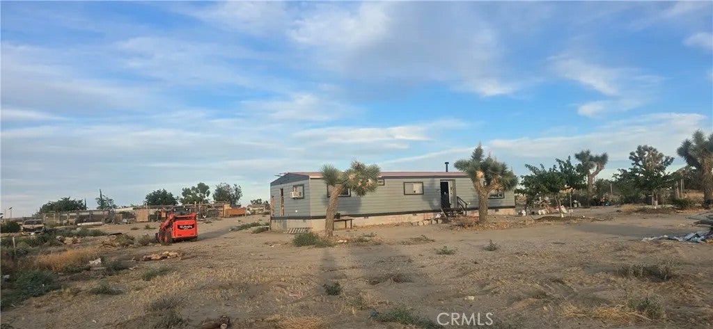 Photo of 13475 Ailanthus RD, Phelan, CA 92371 (MLS # CV26148134)