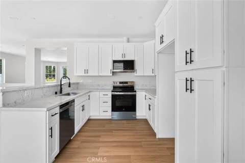 Photo of 595 E 12th Street, Beaumont, CA 92223 (MLS # DW26185219)