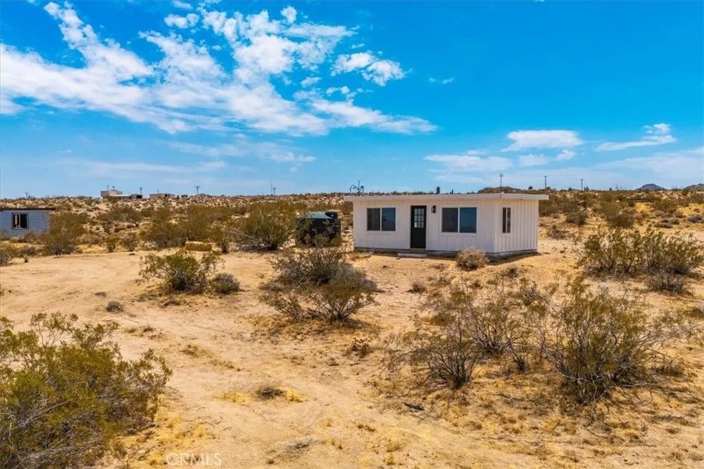 Photo of 1234 Quail Bush Road, Landers, CA 92285 (MLS # JT25266671)