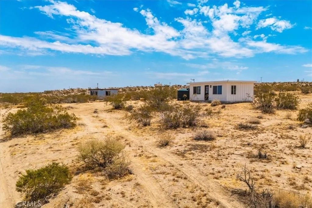 Photo of 1234 Quail Bush Road, Landers, CA 92285 (MLS # JT25266671)