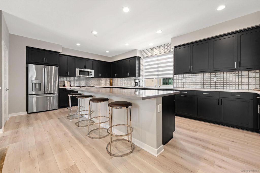 Photo of 6164 Colt Pl #101, Carlsbad, CA 92009 (MLS # 250028036)