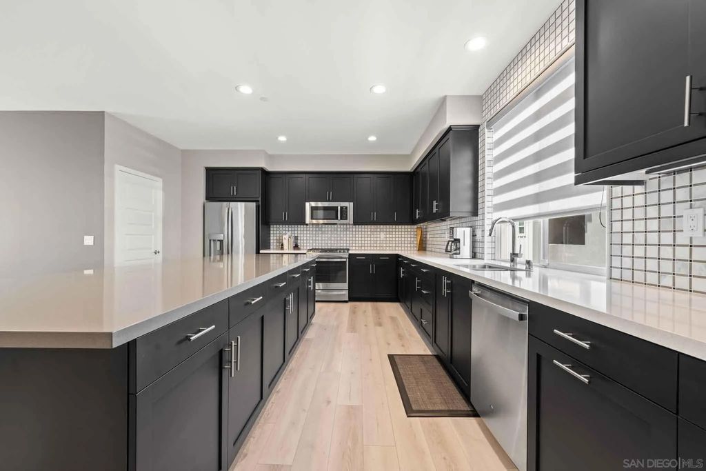 Photo of 6164 Colt Pl #101, Carlsbad, CA 92009 (MLS # 250028036)