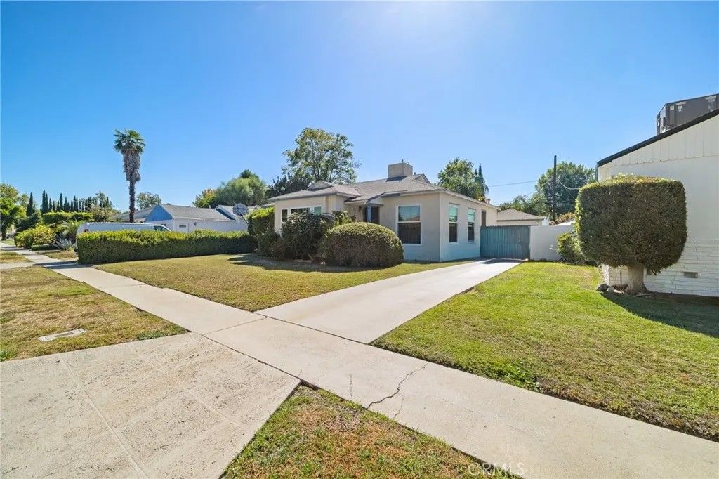 Photo of 17650 Welby Way, Van Nuys, CA 91406 (MLS # SR25238811)