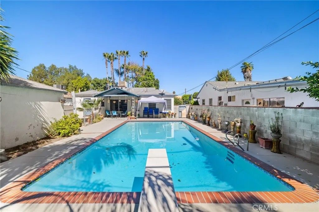 Photo of 17650 Welby Way, Van Nuys, CA 91406 (MLS # SR25238811)