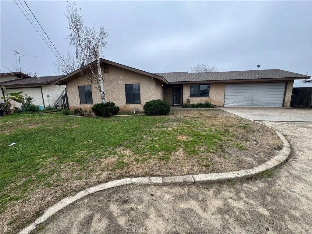 Photo of 2433 W Clemenceau Ave, Caruthers, CA 93609 (MLS # SC25282316)