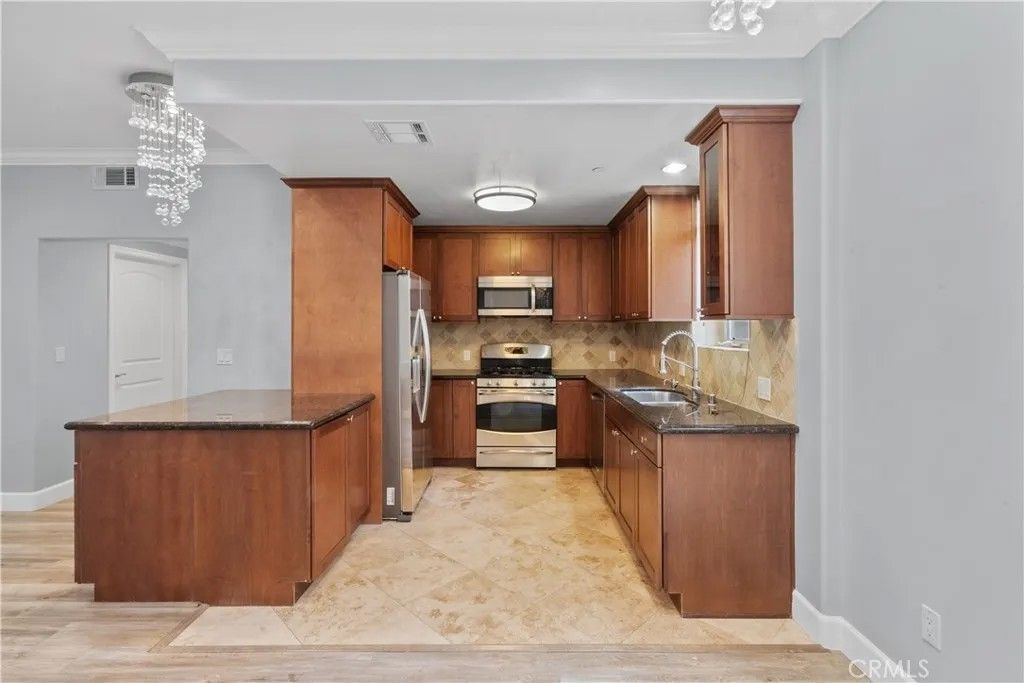 Photo of 11280 La Maida Street #303, North Hollywood, CA 91601 (MLS # SR26016876)