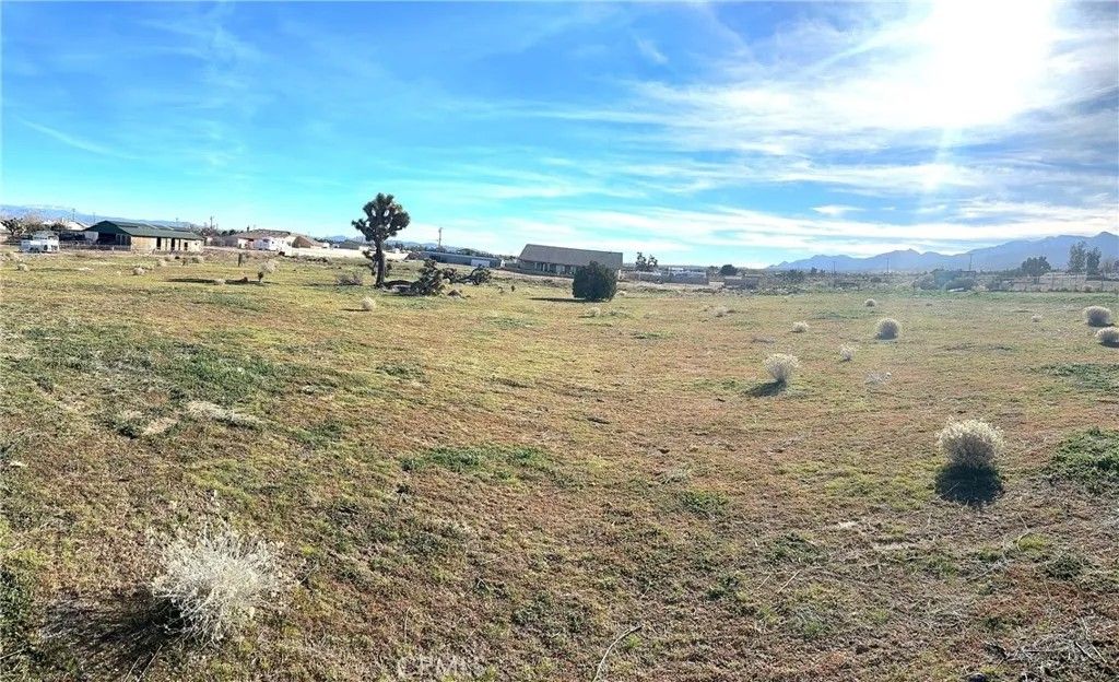 Photo of 8785 Bonanza Rd, Phelan, CA 92371 (MLS # CV26023083)