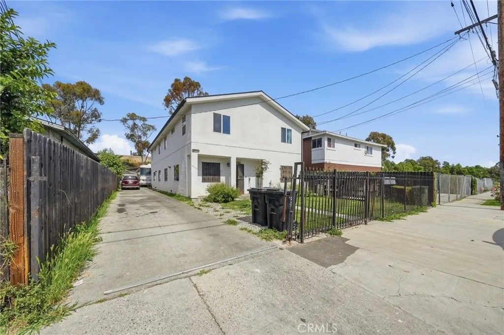 Photo of 1645 E 117th, Los Angeles, CA 90059 (MLS # PW26054699)