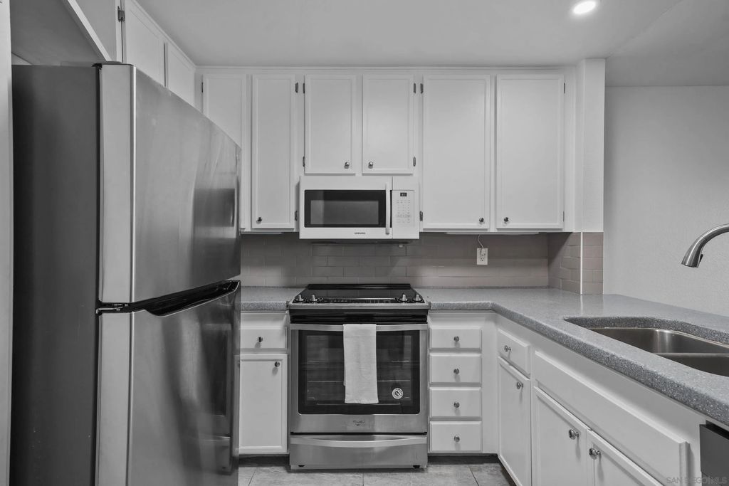 Photo of 5980 Dandridge Ln, San Diego, CA 92115 (MLS # 250041497)