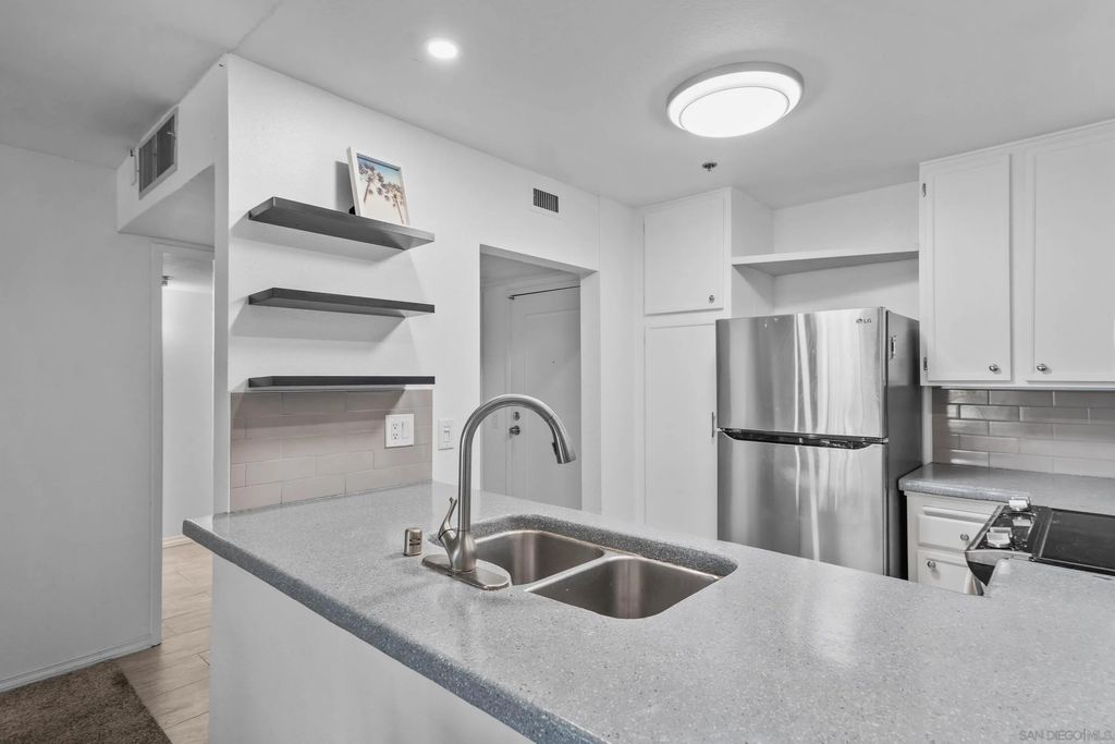 Photo of 5980 Dandridge Ln, San Diego, CA 92115 (MLS # 250041497)