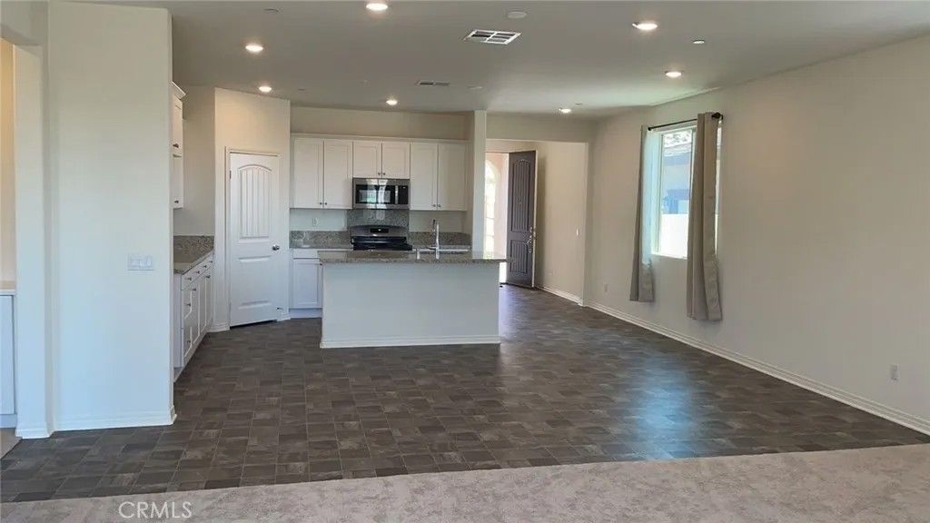 Photo of 2965 Flagstaff Dr, Jurupa Valley, CA 92509 (MLS # TR25242937)