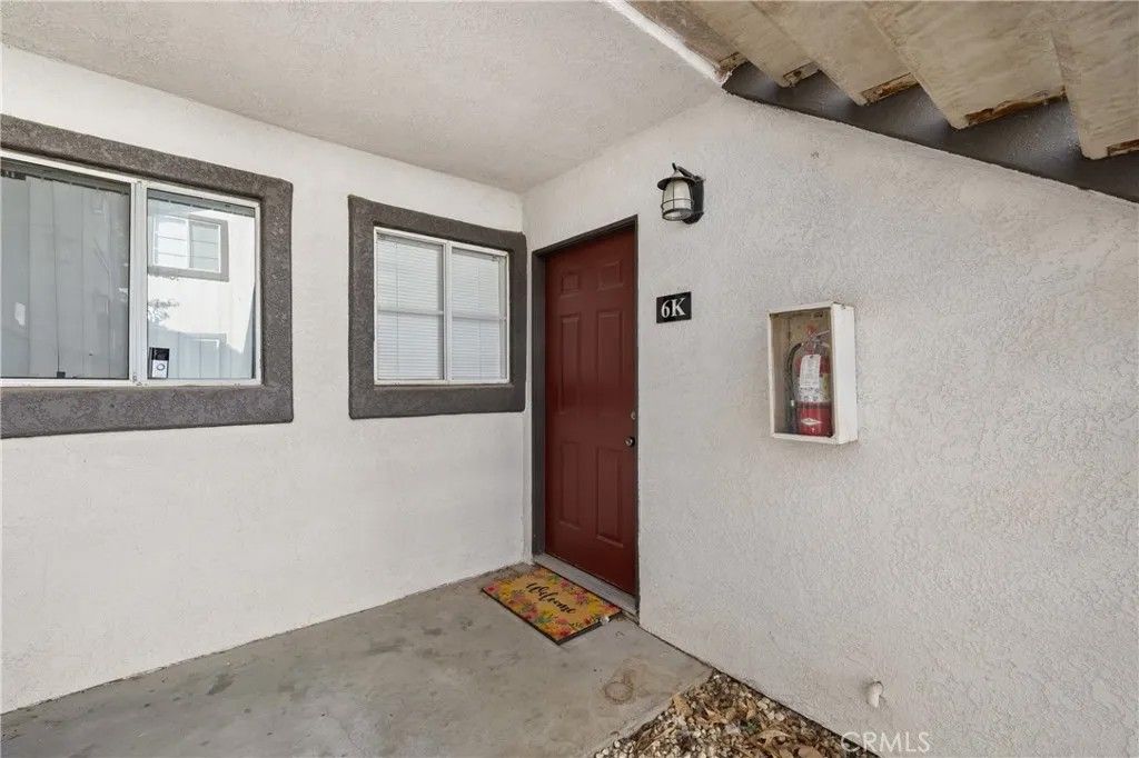 Photo of 16377 Lakeshore Dr #6K, Lake Elsinore, CA 92530 (MLS # SW26020336)