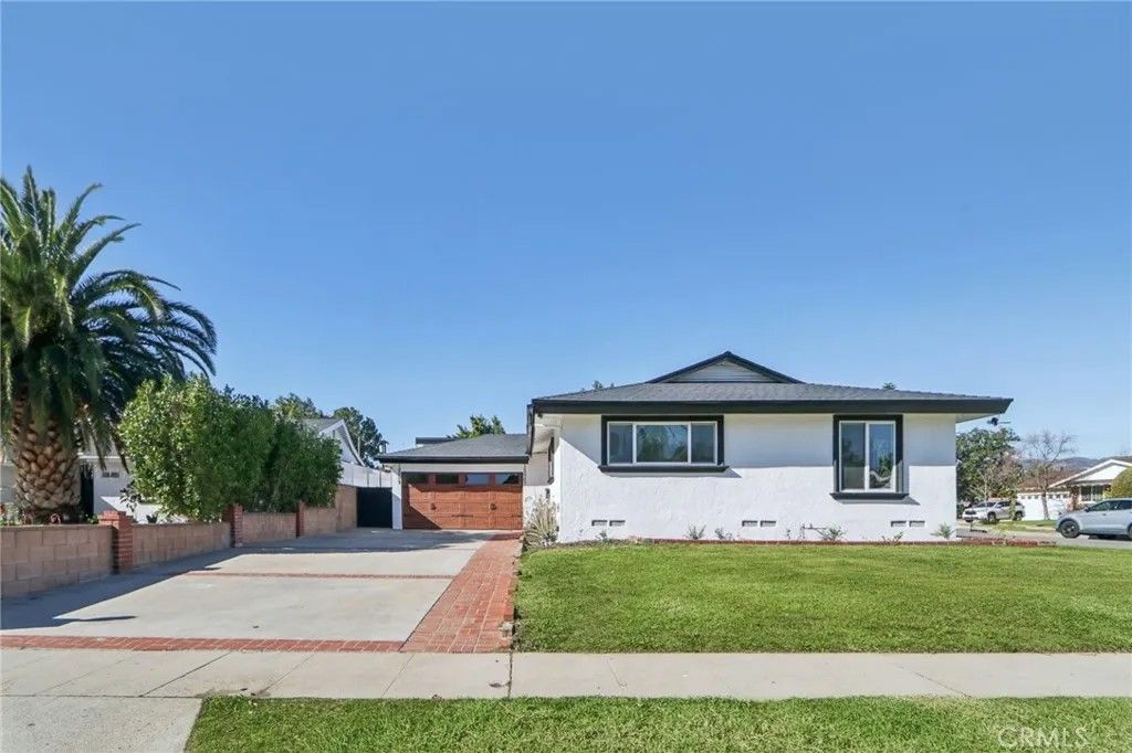 Photo of 10007 Debra Avenue, Granada Hills, CA 91343 (MLS # CV26053007)