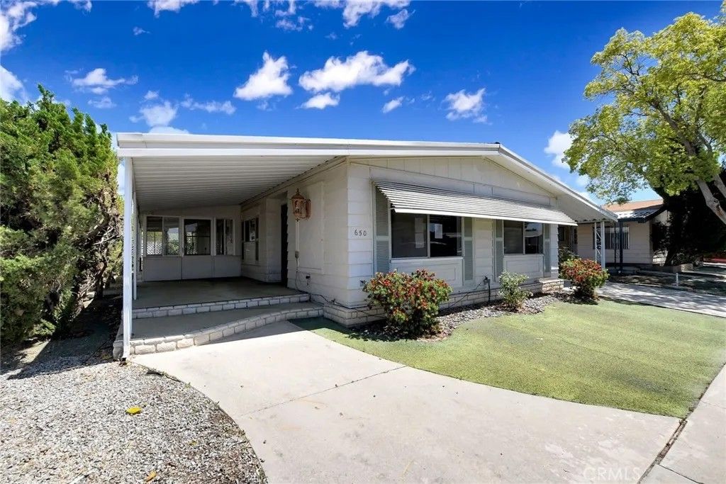 Photo of 650 Seville Drive, Hemet, CA 92543 (MLS # TR26089028)