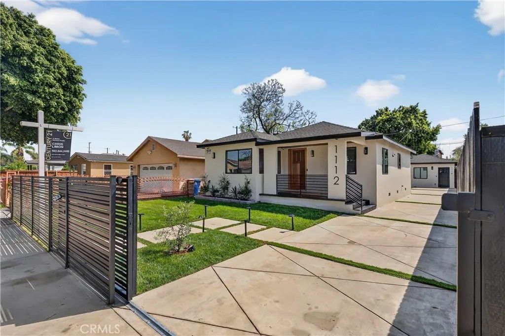 Photo of 1112 E 102nd Street, Los Angeles, CA 90002 (MLS # DW26067046)