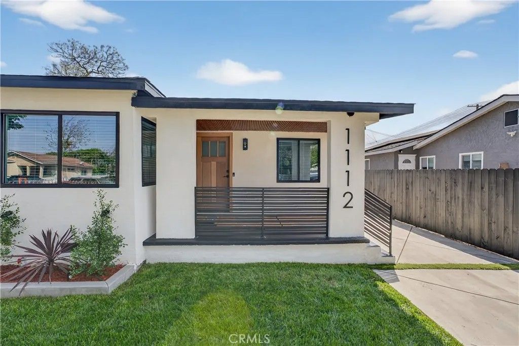 Photo of 1112 E 102nd Street, Los Angeles, CA 90002 (MLS # DW26067046)