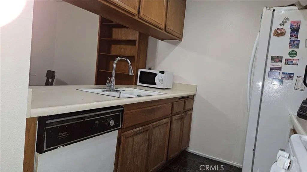 Photo of 12427 Rock Springs Court, Garden Grove, CA 92843 (MLS # OC26011897)