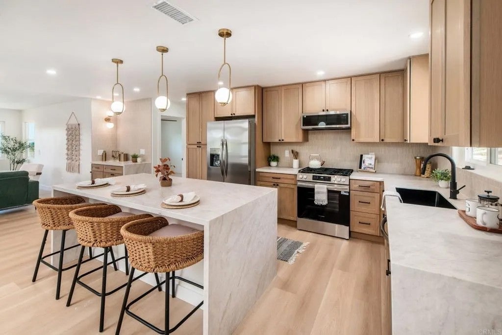 Photo of 2430 Sunflower TER, Vista, CA 92083 (MLS # NDP2608361)