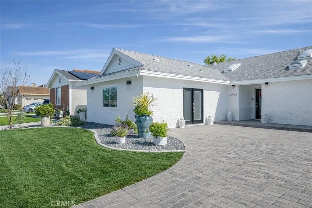 Photo of 11922 Reagan St, Los Alamitos, CA 90720 (MLS # PW26032829)