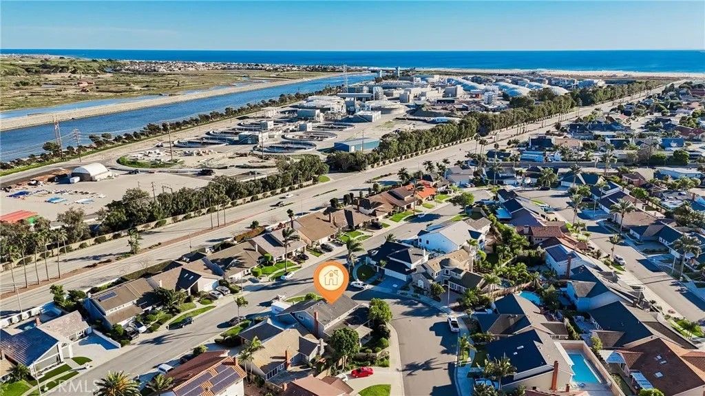 Photo of 21891 Summerwind Ln, Huntington Beach, CA 92646 (MLS # OC26029014)