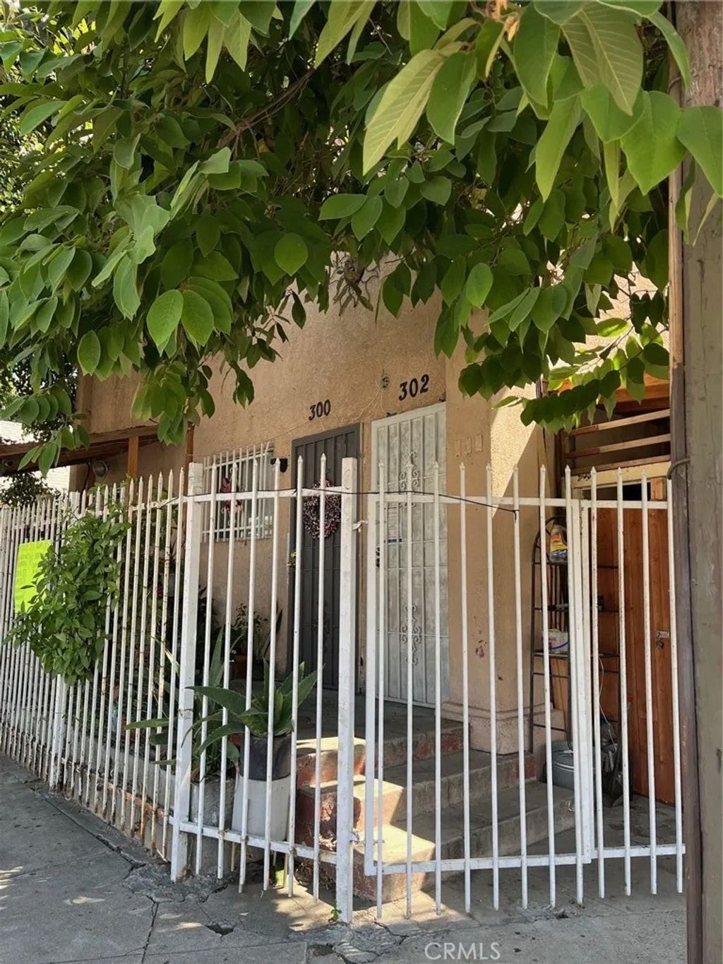Photo of 300 E 42nd Place, Los Angeles, CA 90011 (MLS # DW26005704)