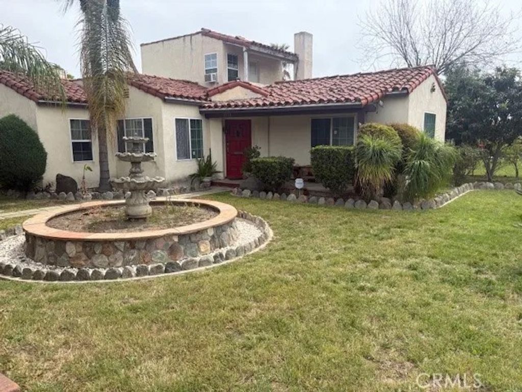 Photo of 2196 N Orange Grove Avenue, Pomona, CA 91768 (MLS # PW26088716)