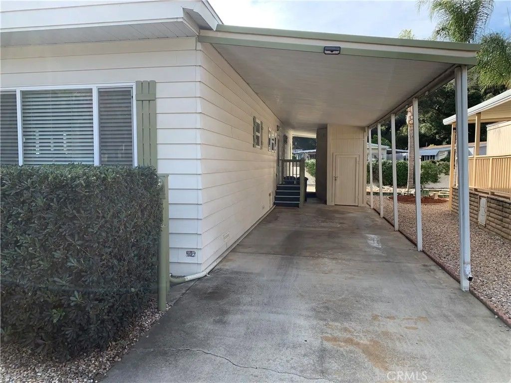 Photo of 8975 Lawrence Welk Dr #52, Escondido, CA 92026 (MLS # OC25265134)