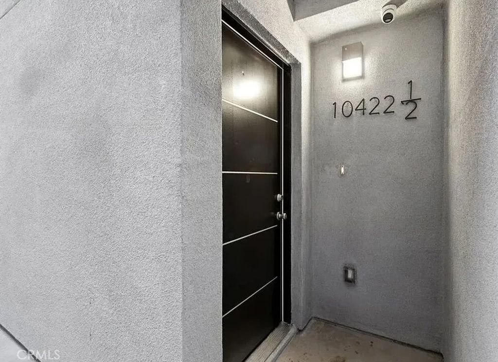 Photo of 10422 Graham Avenue, Los Angeles, CA 90002 (MLS # PW26026698)