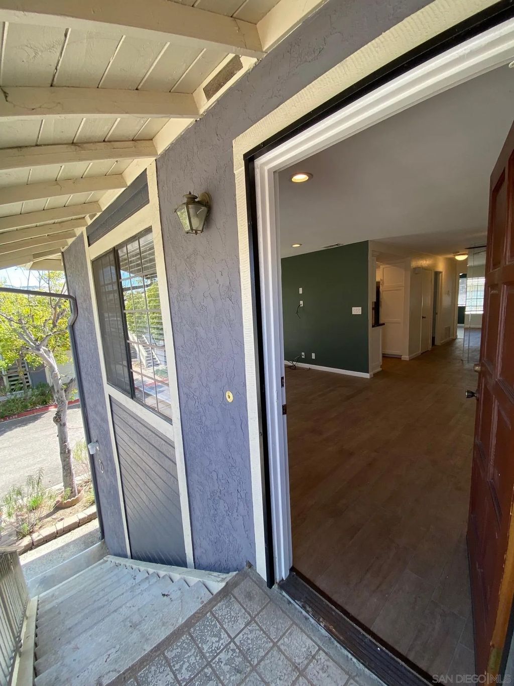 Photo of 8834 Tamberly Ln #D, Santee, CA 92071 (MLS # 260001363)