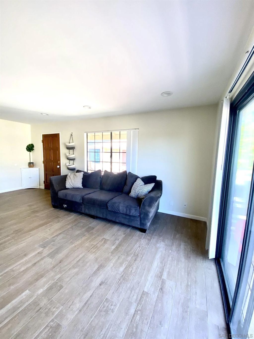 Photo of 8834 Tamberly Ln #D, Santee, CA 92071 (MLS # 260001363)