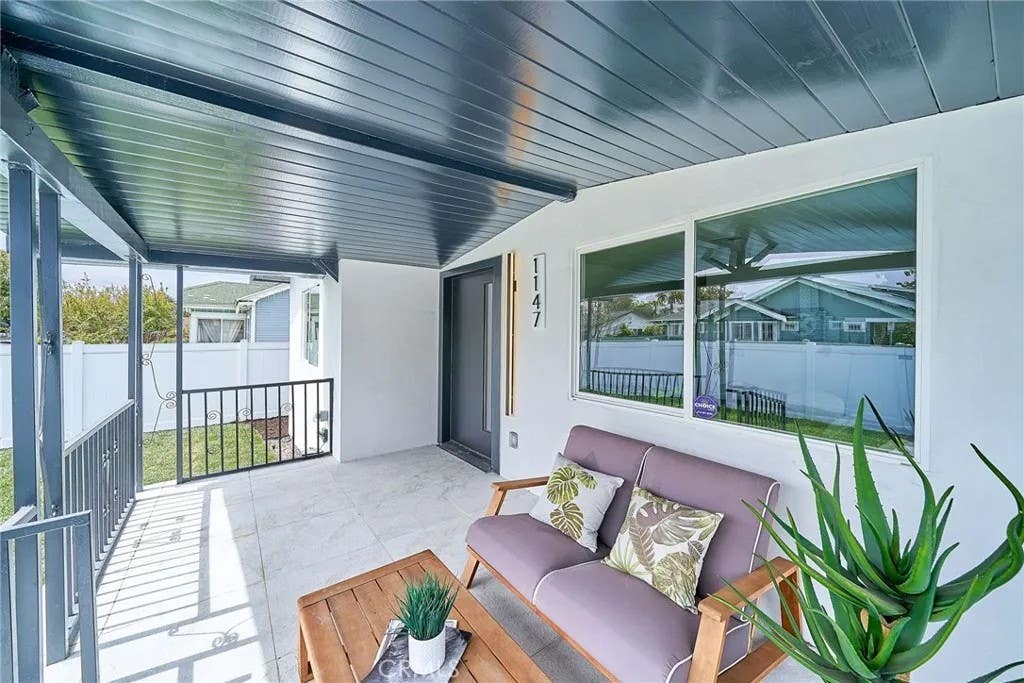 Photo of 1147 W 39th PL, Los Angeles, CA 90037 (MLS # PV26119339)