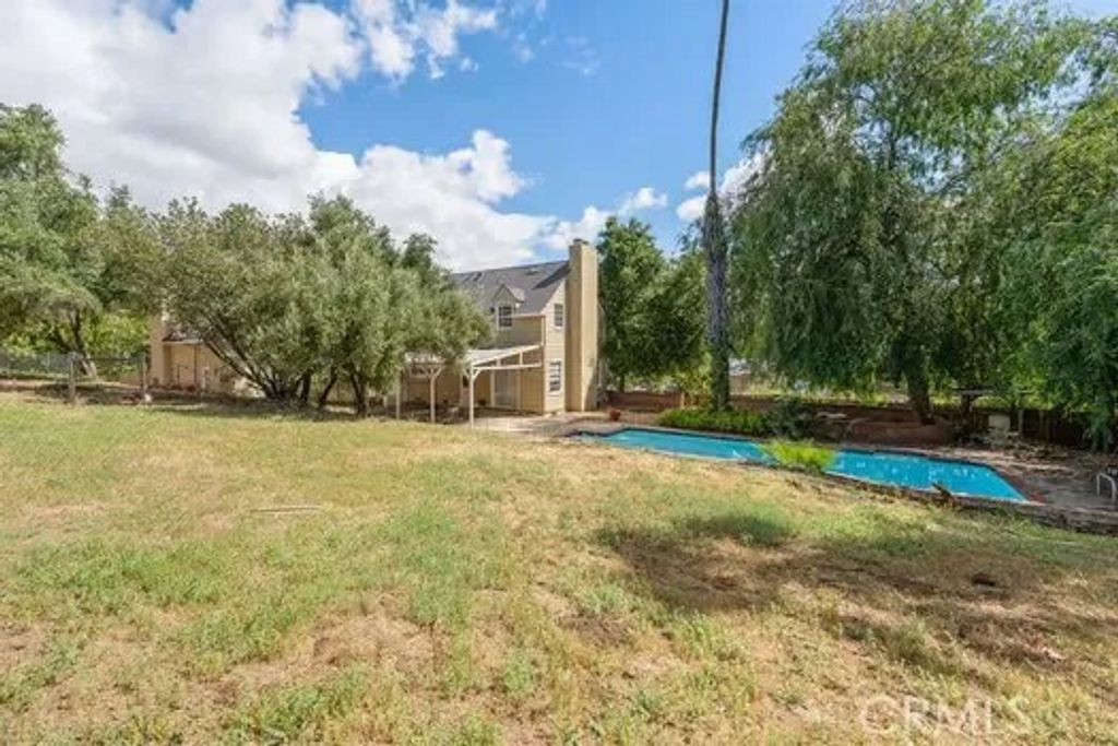 Photo of 4874 Palo Dr, Tarzana, CA 91356 (MLS # SR26062276)