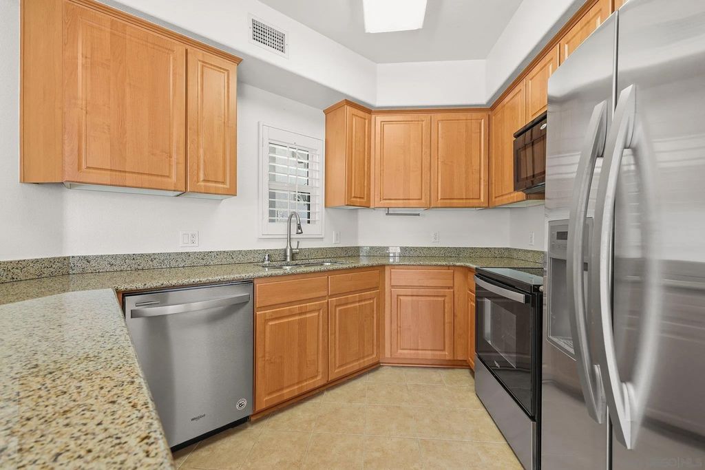 Photo of 2708 Lake Pointe Dr #209, Spring Valley, CA 91977 (MLS # 260009286)