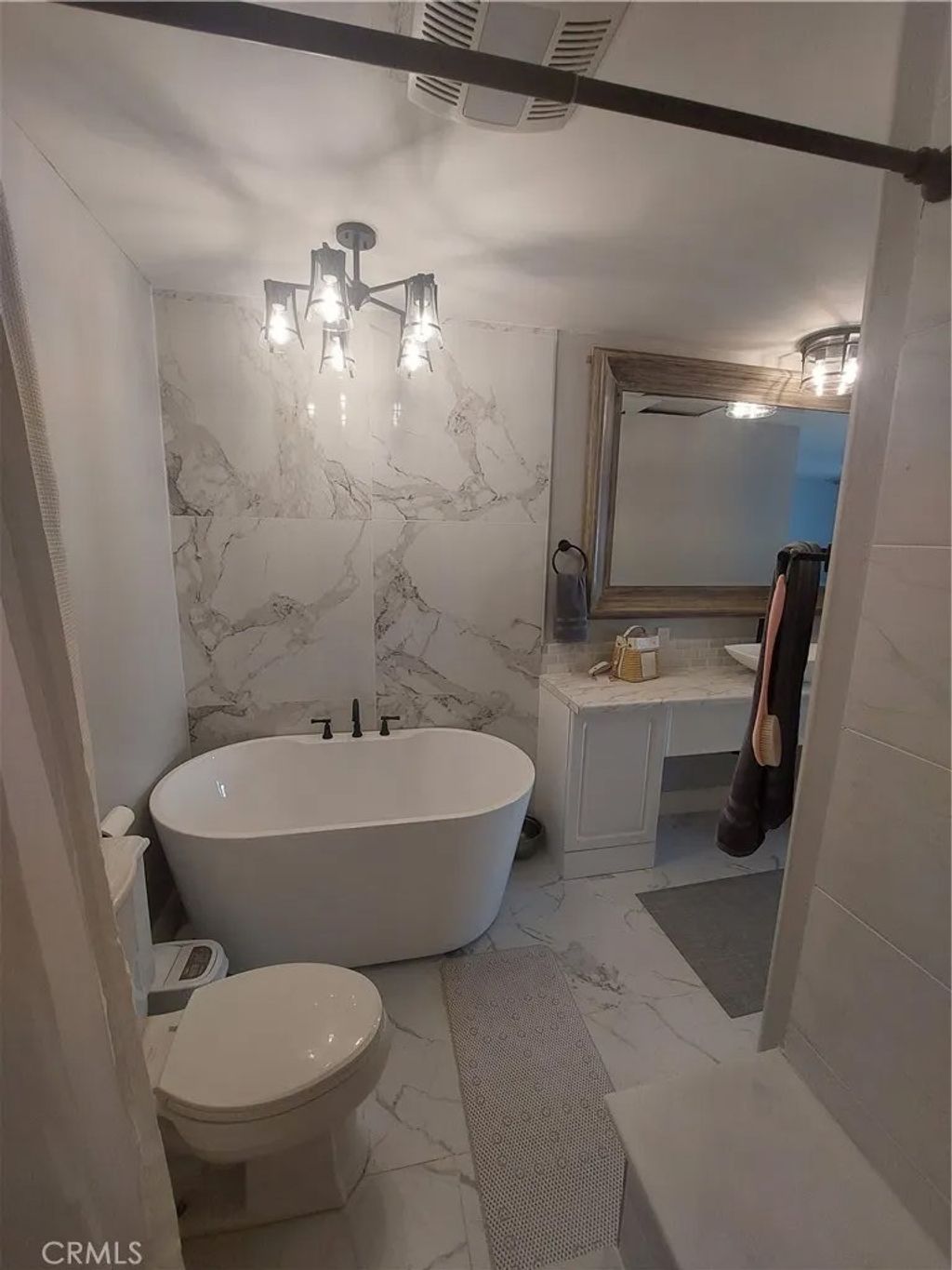 Photo of 2297 Levante St, Carlsbad, CA 92009 (MLS # OC26028775)