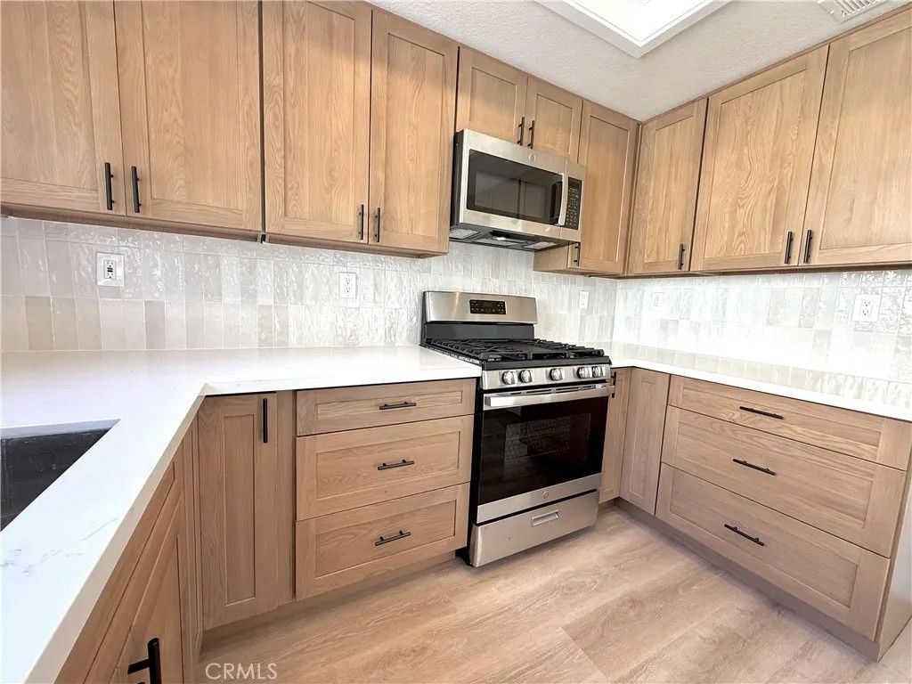 Photo of 21125 Gladiolos Way, Lake Forest, CA 92630 (MLS # OC26037492)