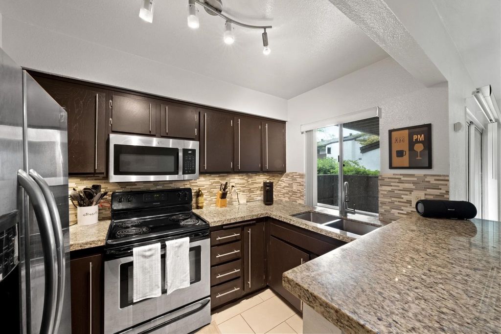 Photo of 8023 Caminito De Pizza #E, San Diego, CA 92108 (MLS # 260010282)