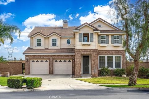 Photo of 15621 Pisa Lane, Fontana, CA 92336 (MLS # TR26028264)