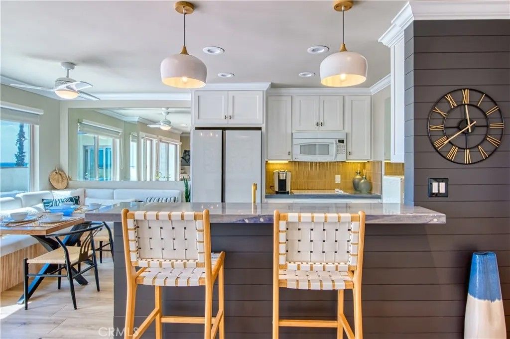 Photo of 711 Pacific Coast Hwy #421, Huntington Beach, CA 92648 (MLS # OC25238800)