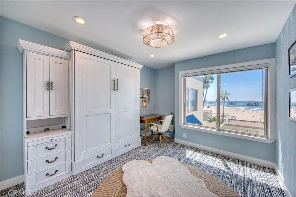 Photo of 711 Pacific Coast Hwy #421, Huntington Beach, CA 92648 (MLS # OC25238800)
